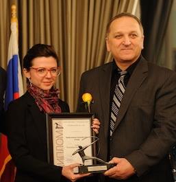 Anna Kiryakova / Mikhail Farfel recieve Silver Archer award on behalf of IPFF in Washington, DC on January 29, 2016